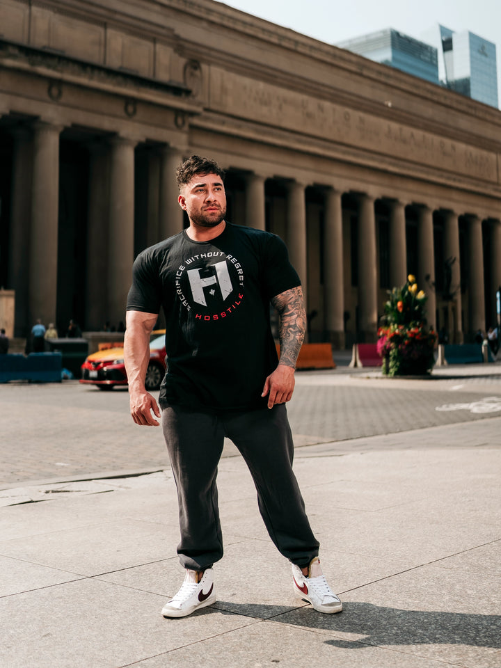 Bodybuilder wearing the OG Sacrifice Gym T-Shirt#color_black