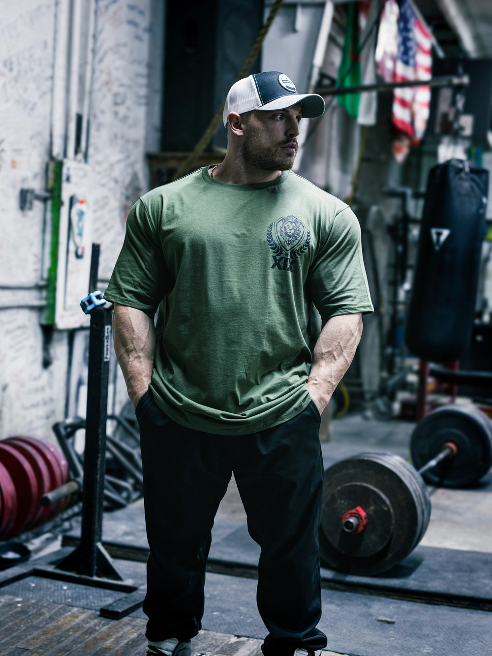 Bodybuilder Martin Fitzwater wearing the Samson Dauda Olympia Edition Vintage T-Shirts#color_light-olive